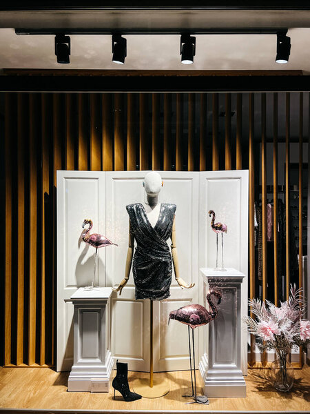 Shop window with women evening dress. High quality photo