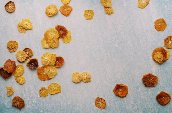 Scattered pieces of dried fruits on a blue scratched background. High quality photo — Stock Image Scattered Pieces Dried Fruits Blue Scratched Background High Quality Photo Stock Picture