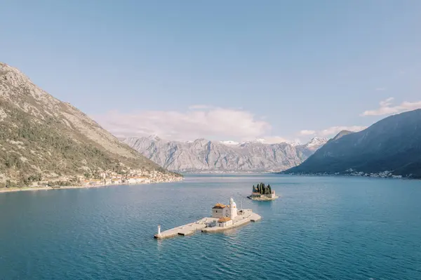 stock image Island of Gospa od Skrpjela against the backdrop of the island of St. George in the Bay of Kotor. Montenegro. Drone. High quality photo