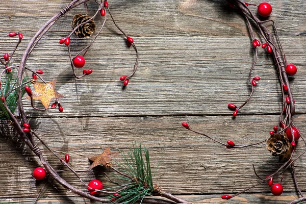 stock image Grape vine traditional Christmas decorations, farmhouse style, on a wooden background, no text