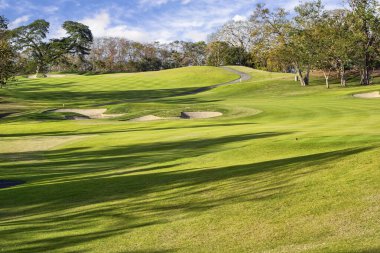 Kosta Rika 'da bakımlı ve manikürlü bir golf sahası.
