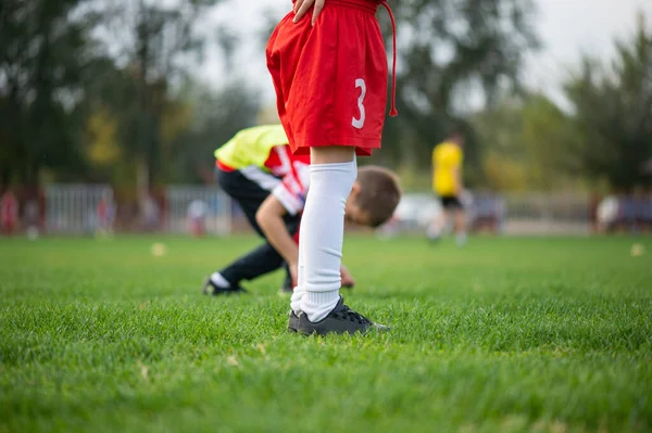 Close Legs Feet Child Soccer Player Black Football Boots Red — Stok fotoğraf