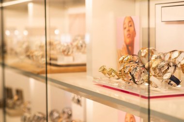 Luxury women's and men's watches in the shop window 