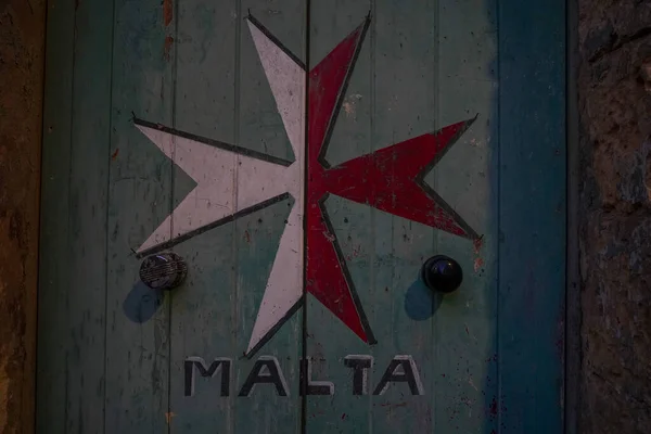 malta red cross symbol detail close up
