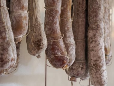 Salami Italian different traditional sausages at the store.