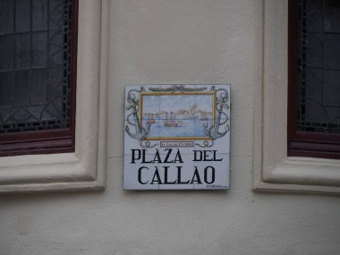 MADRID, SPAIN - DECEMBER 14, 2022: Street plaza del callao name sign on in Madrid, capital of Spain renowned for its rich repositories of European art