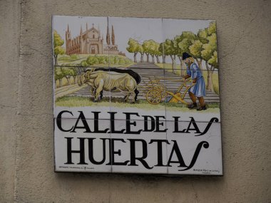 MADRID, SPAIN - DECEMBER 14, 2022: Street name calle de las huertas sign on in Madrid, capital of Spain renowned for its rich repositories of European art