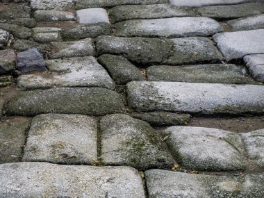 Roman stone path at Old Mosque of Bab al-Mardum or Hermitage of Cristo de la Luz. Historic city of Toledo. Spain. UNESCO World Heritage.