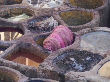 Fes, Morocco, Tannery aerial view Africa Old tanks of the Fez's tanneries with color paint for leather.