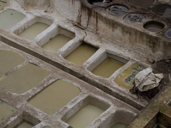 Fes, Morocco, Tannery aerial view Africa Old tanks of the Fez's tanneries with color paint for leather.