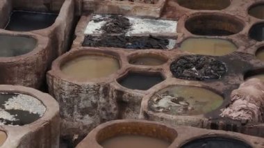 Fes, Morocco, Tannery aerial view Africa Old tanks of the Fez's tanneries with color paint for leather.