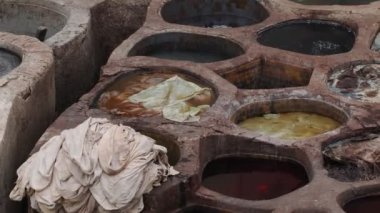 Fes, Morocco, Tannery aerial view Africa Old tanks of the Fez's tanneries with color paint for leather.