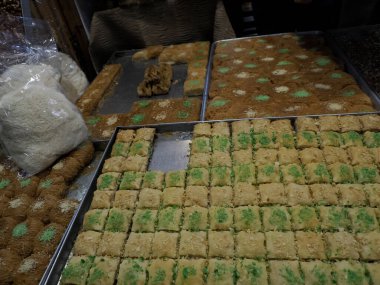 Moroccan biscuits and pastries dipped in honey for sale in the Medina of Fez in Morocco
