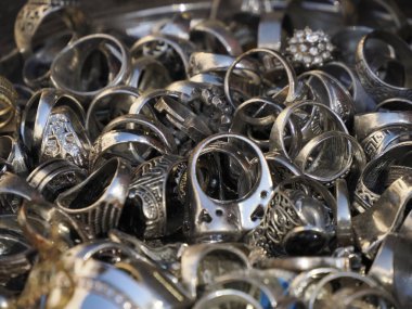 Copper ware shop with crockery, pots and pans in the metal work part of Fes soukh, Morocco