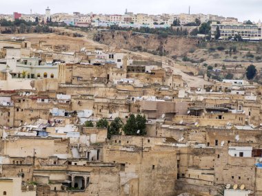 Aerial view of the Fez el Bali medina. Panorama cityscape of the oldest walled part of Fez, Morocco. Fes el Bali was founded as the capital of the Idrisid dynasty between 789 and 808 AD.