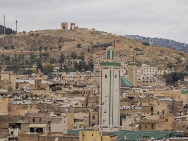 Aerial view of the Fez el Bali medina. Panorama cityscape of the oldest walled part of Fez, Morocco. Fes el Bali was founded as the capital of the Idrisid dynasty between 789 and 808 AD.