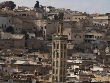Aerial view of the Fez el Bali medina. Panorama cityscape of the oldest walled part of Fez, Morocco. detail of mosque tower