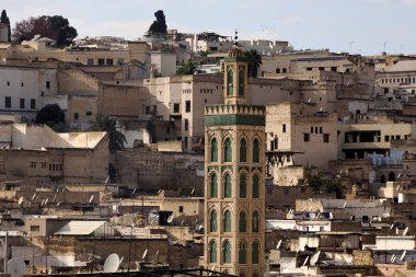 Aerial view of the Fez el Bali medina. Panorama cityscape of the oldest walled part of Fez, Morocco. detail of mosque tower