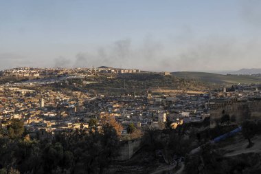 Aerial view of the Fez el Bali medina. Panorama cityscape of the oldest walled part of Fez, Morocco. Fes el Bali was founded as the capital of the Idrisid dynasty between 789 and 808 AD.