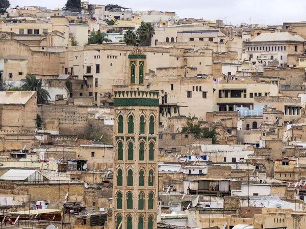Aerial view of the Fez el Bali medina. Panorama cityscape of the oldest walled part of Fez, Morocco. Fes el Bali was founded as the capital of the Idrisid dynasty between 789 and 808 AD.