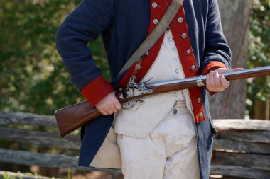 Amerikan Devrimi 'nin tüfeği. İngiliz asker yerleşimci Yorktown, Virginia, ABD' de.