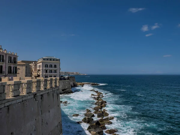 stock image sea on ortigia syracuse old buildings street view on sunny day Sicily, Italy