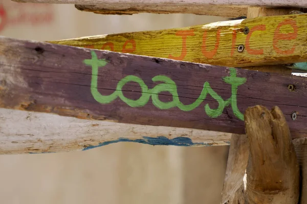 Toast Wood Sign Detail Close — Stock Photo, Image