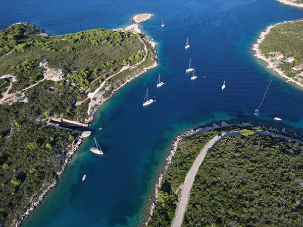 A Submarine world war Hangar in Vis Island, Italian Lissa, island of Croatia in the Adriatic Sea. It is the outermost major island of the Dalmatian archipelago panoramic aerial view landscape