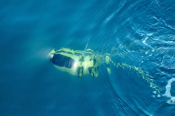 A submarine underwater drone exploring the abyss