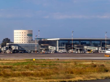 The catania airport view from runway clipart