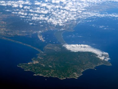 The Argentario promontory aerial view from airplane window clipart