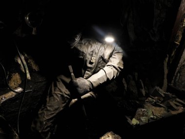 Colombian emerald miners in Muzo, Boyaca in the Santander department of Colombia. It is estimated that Colombia accounts for 70-90% of the world's emerald market. clipart