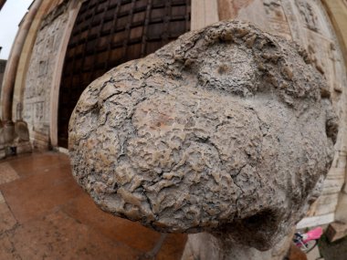 The San Zeno Basilica Church in Verona Italy, detail of exterior sculptures and bas relief clipart