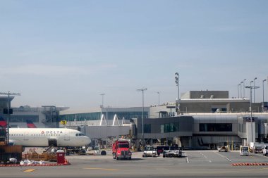 NEW YORK, USA - AUGUST 29 2024 - La Guardia Airport view from airplane cabin before taking off clipart