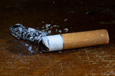 A Cigarette butt and ash close up
