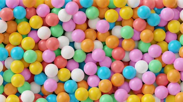 Bolas de plástico coloridas na grande piscina seca no centro de