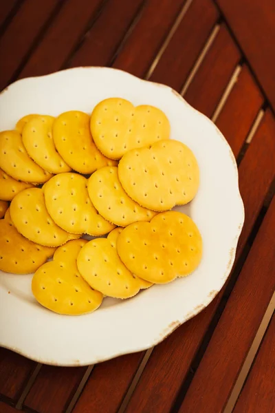 cookies on a plate for tea drinking. high-calorie flour treats for breakfast