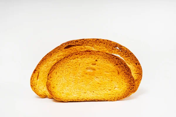 パンを薄切りにしたものです オーブンで調理された甘い白いパン 白い背景に小麦粉のお菓子 — ストック写真