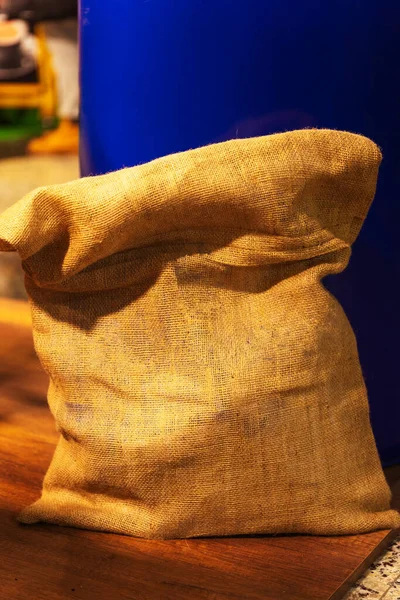 transport bag for green coffee. burlap bag full of fresh coffee beans. bag at coffee exhibition in istanbul city