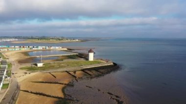 Günbatımında Brightlingsea deniz feneri kulesi, büyüleyici hafif deniz kıyısında özel bir gün, Essex, İngiltere, İngiltere