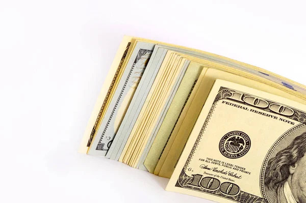 Thousand dollar bills. Stack of American dollars on a white background. Millionaire with dollars. Salary in dollars