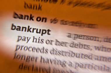 Bankrupt - a person judged by a court to be insolvent, whose property is taken and disposed of for the benefit of their creditors clipart