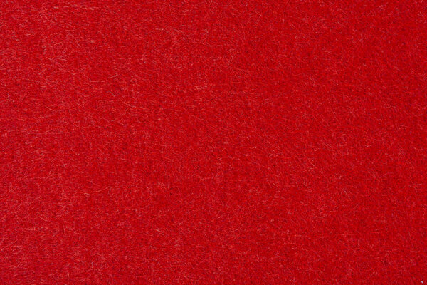 Red boiled wool or wool felt texture. High quality photo