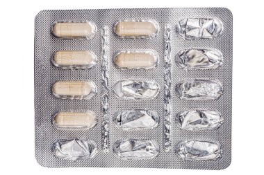 Kabarcıklarda tabletler boş. Boş gümüş kabarcık. Kabarcık tabletleri kullanılmış. İlaçlar yüzünden su topladı. Yüksek kalite fotoğraf