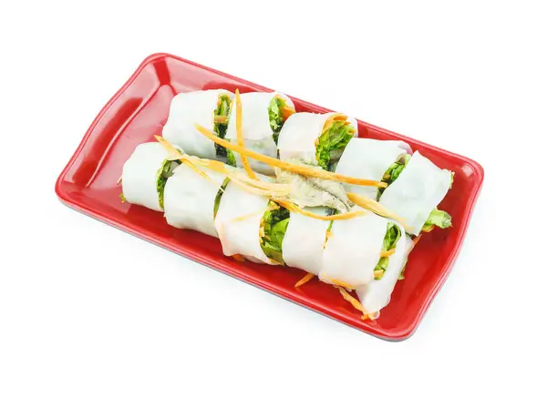 Sebzeli börek ve tabakta balık.