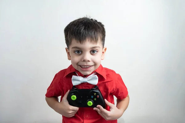 Cute boy with classic clothes - Holding video game controller