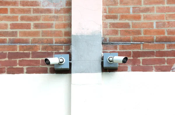 Two Surveillance Cameras Installed Red Brick Wall — Stock Photo, Image