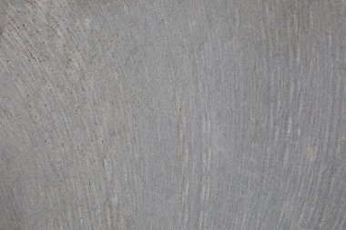 Tırmalanmış pürüzlü taş dokusu.