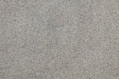 Terrazzo dikişsiz duvarının gri rengi. Çakıl taşı zemin dokusu ve arkaplanı