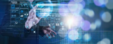 Ticari işlemler bilançosu ve gelir tablosu ile ilgili mali rapor verileri ve diyagramı geleceğin kavramı olarak gösterir.İş adamı eli modern yenilikçi bilgisayar dasboard 'u.